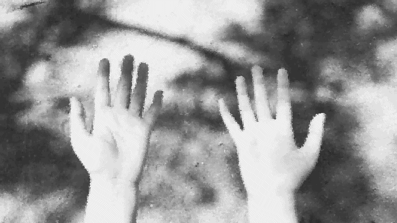 Hands zooming into protein structures